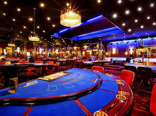 Atmospheric event venue interior with warm lighting and themed casino-style decoration