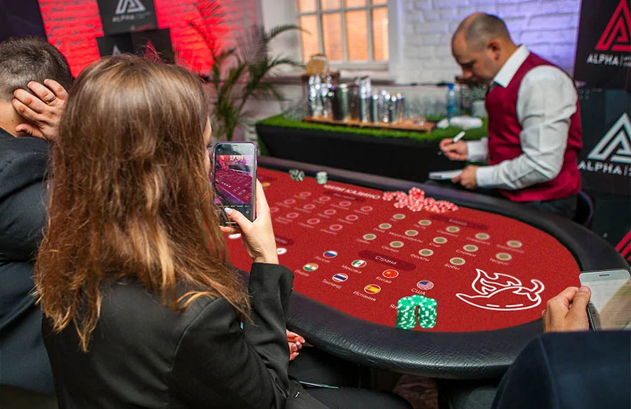 Corporate guests networking around themed entertainment stations